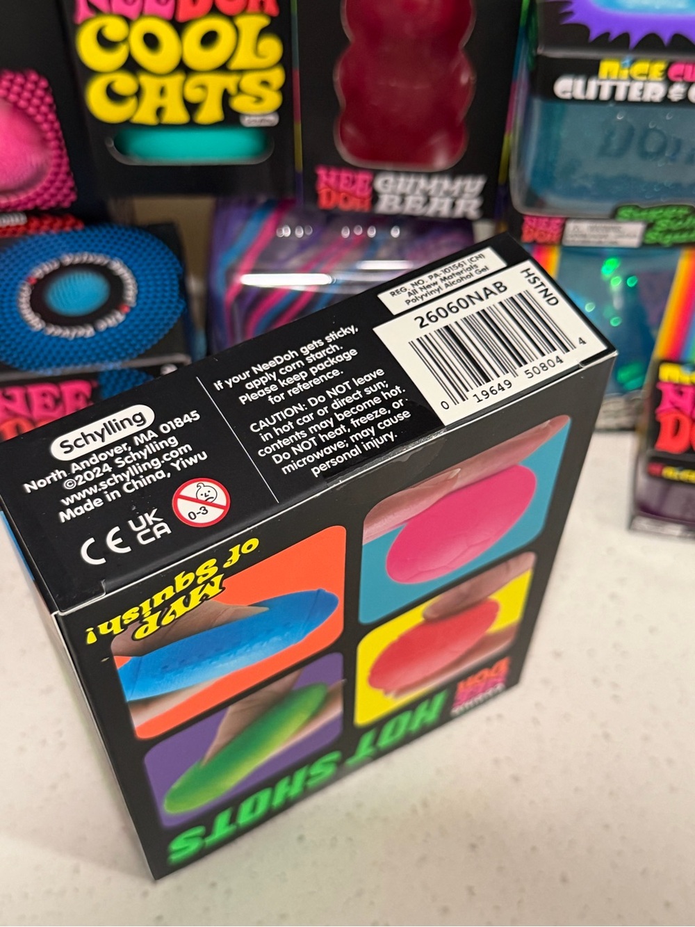 NeeDoh Hot Shots 4-Pack Squish Balls - Pink, Green, Orange, Blue NWT - Picture 3 of 5